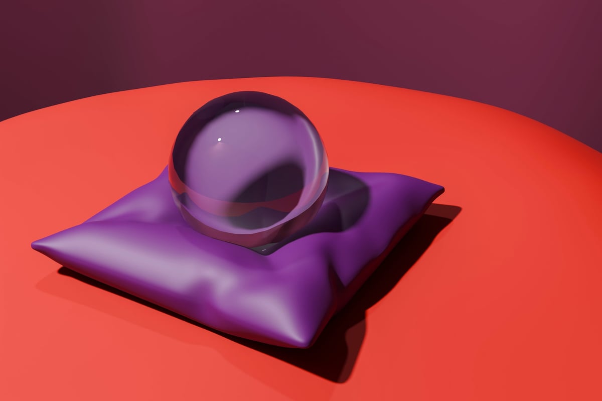 A glowing crystal ball resting on a purple cushion, bathed in soft golden light